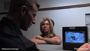 Big tits blonde shemale Carmen Cruz has fantasy to boning airport security guy Rusty Stevens and finally she handcuffs and anal fucks him in the office